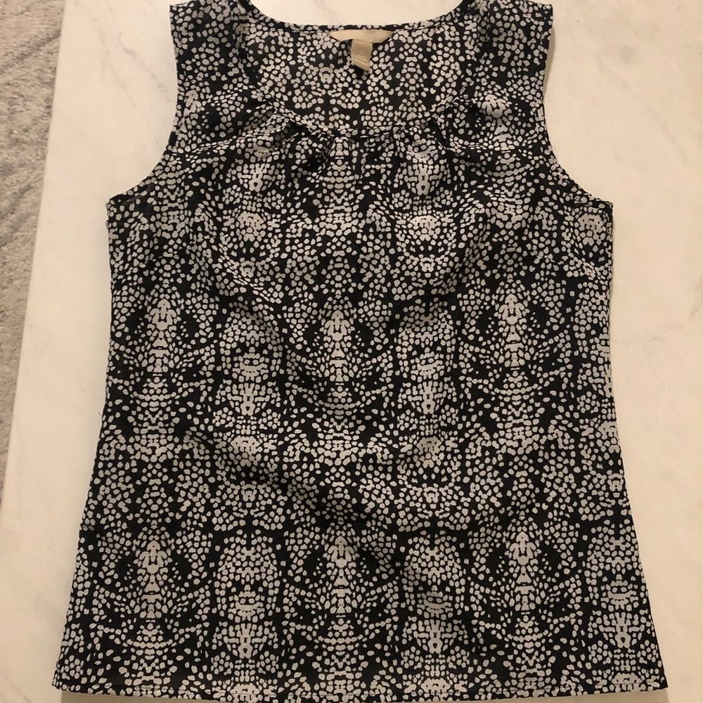 Banana Republic sleeveless blouse with cute collar eyelet cut outs in size small